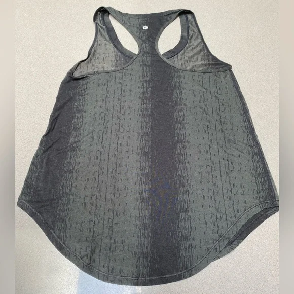 Lululemon Pocket Racerback Tank Top in Black paintbrush strokes design. Size 6 - Picture 2 of 4